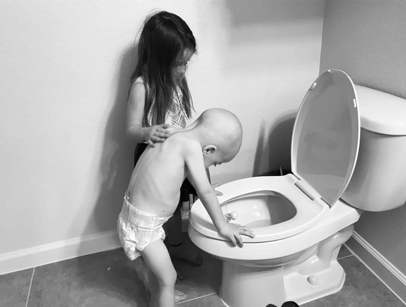 Texas boy fighting cancer gets comfort from sister